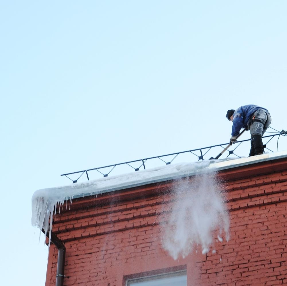 Clearing snow from the roof